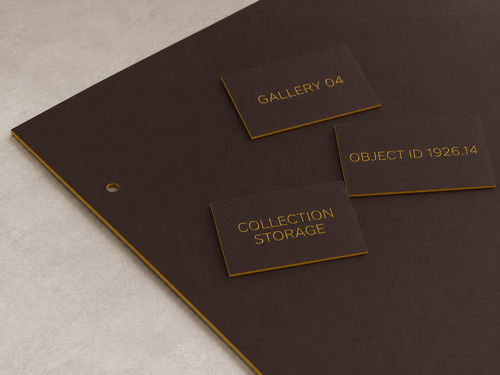 LYS-7017 museum exhibit identification engraving laminate with thin matte dark-brown face continuous gold core and recessed gold wording