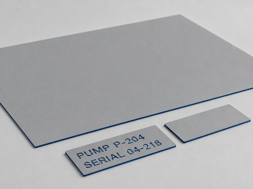 LYS-7031 matte neutral gray dark navy core two-ply nameplate material with shallow recessed equipment data