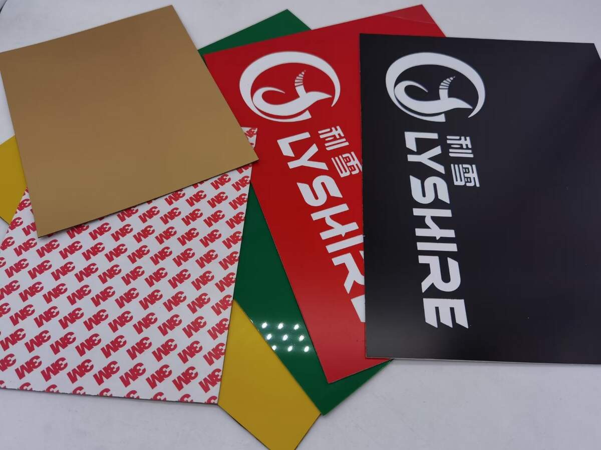 Real LYSHIRE engraving plastic sheets and engraved samples with optional 3M adhesive backing