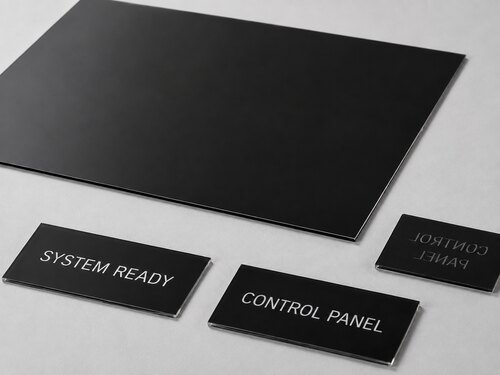 LYS-7132 clear black acrylic reverse engraving sheet showing a transparent body and thin black rear coating